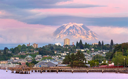 Mount Rainier over Tacoma, WA Waterfront at dusk.